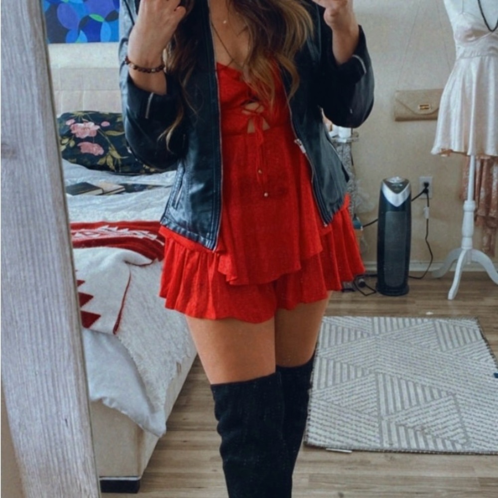 Red Jumpsuit with Black Jacket